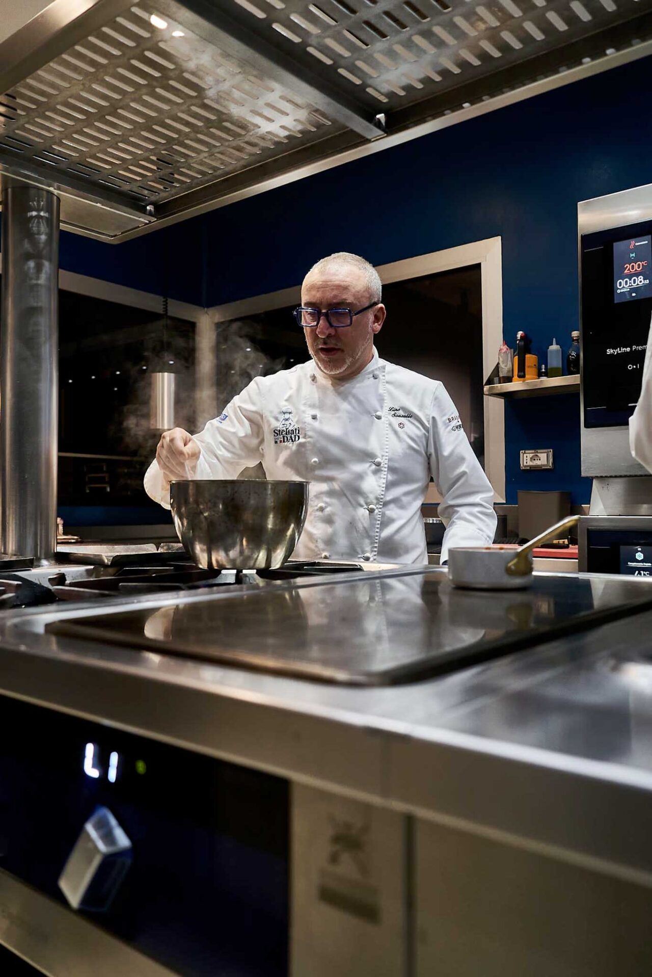 Lino Scarallo tra gli chef di Palazzo Petrucci per il libro di Bottura